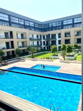 Modern studio apt with pool &gym